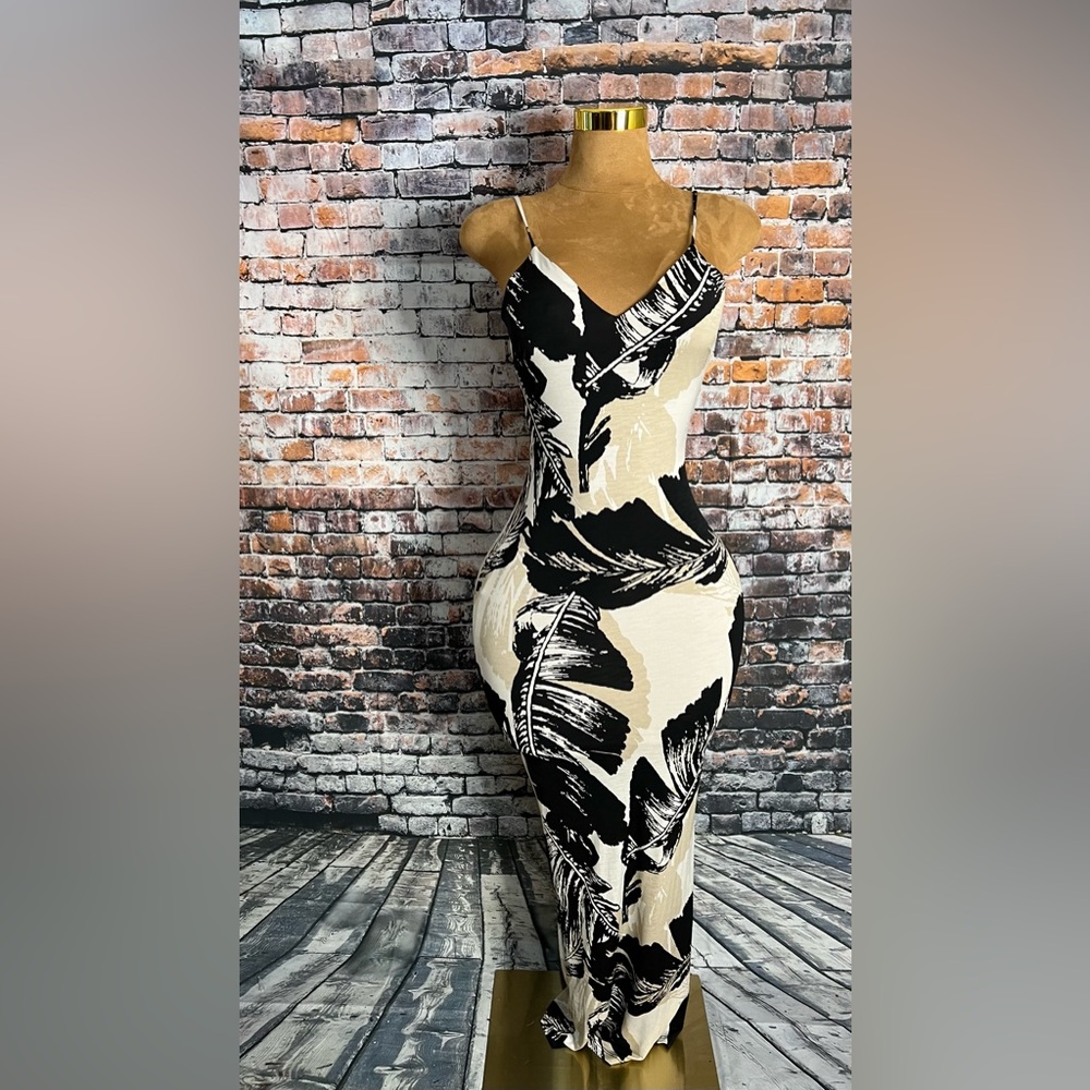 Maxi tropical dress with flowers.  Size small but has plenty of stretch.